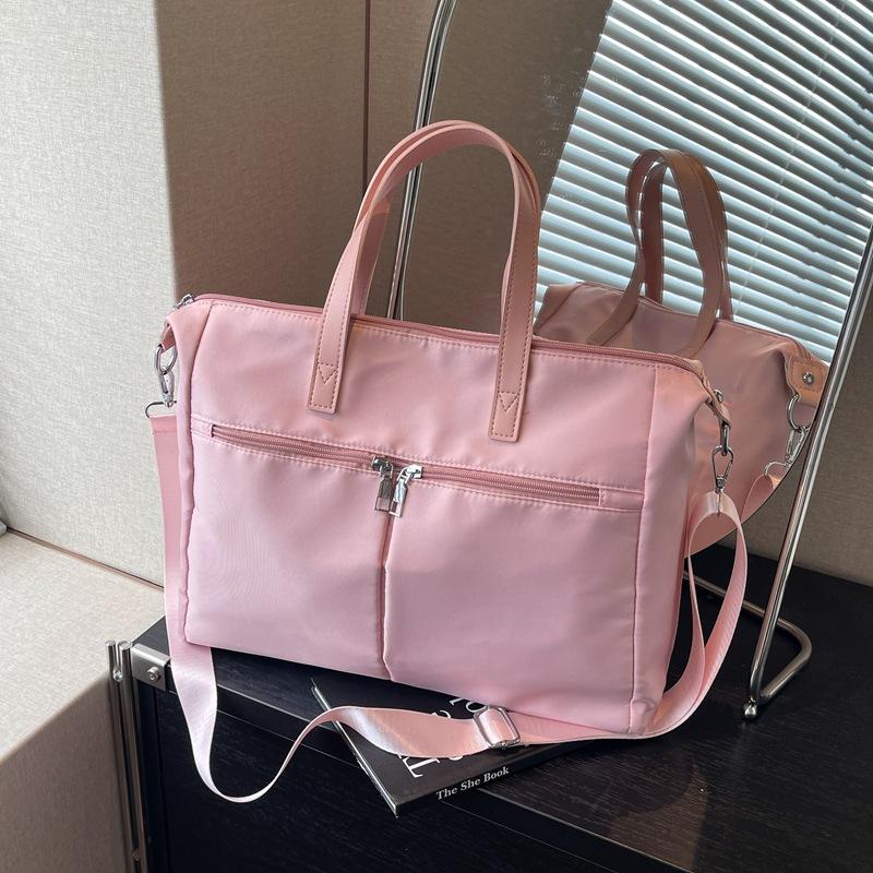 

Oxford cloth bag women s tote bag large capacity autumn messenger 2024 new casual portable class commuter bag рожевий