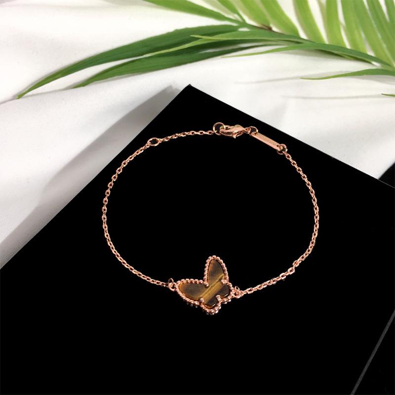 Pulseira Simples Estilo Frio INS Borboleta: Design Suave e Fresco Japonês e Coreano com Carcaça Branca para Mulheres