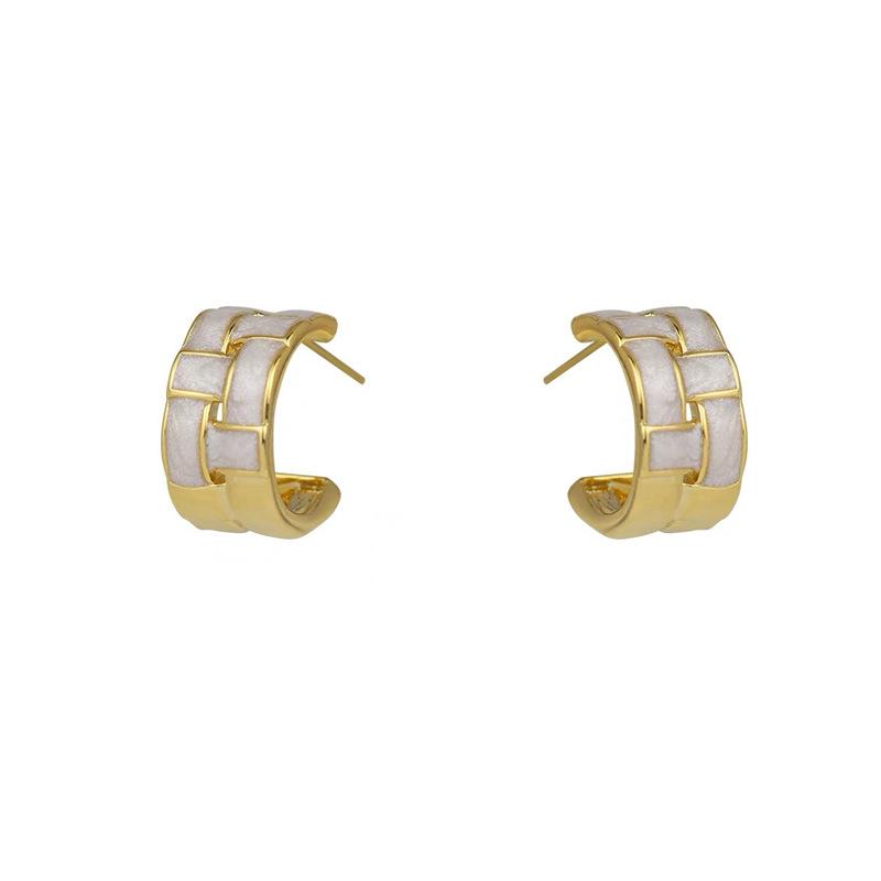 Japanese and Korean metal woven oil drip ear clips spring and summer geometric niche design stud earrings simple retro silicone no ear piercings