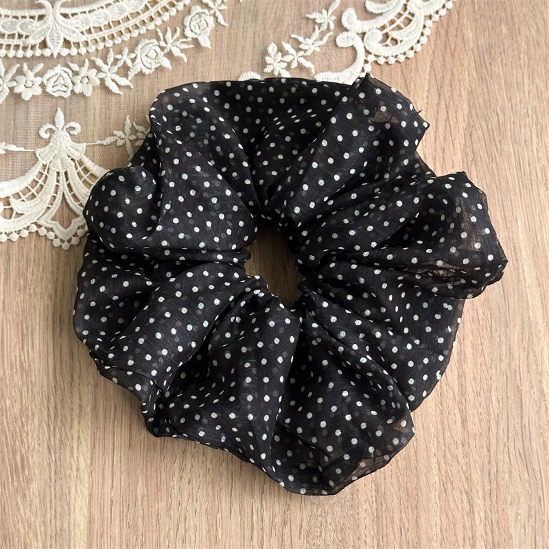 

Lightweight Polka-Dot Sheer Scrunchies Offer Delicate Retro Charm With Breathable Mesh Material For Comfortable Styling Black Dot Scrunchie