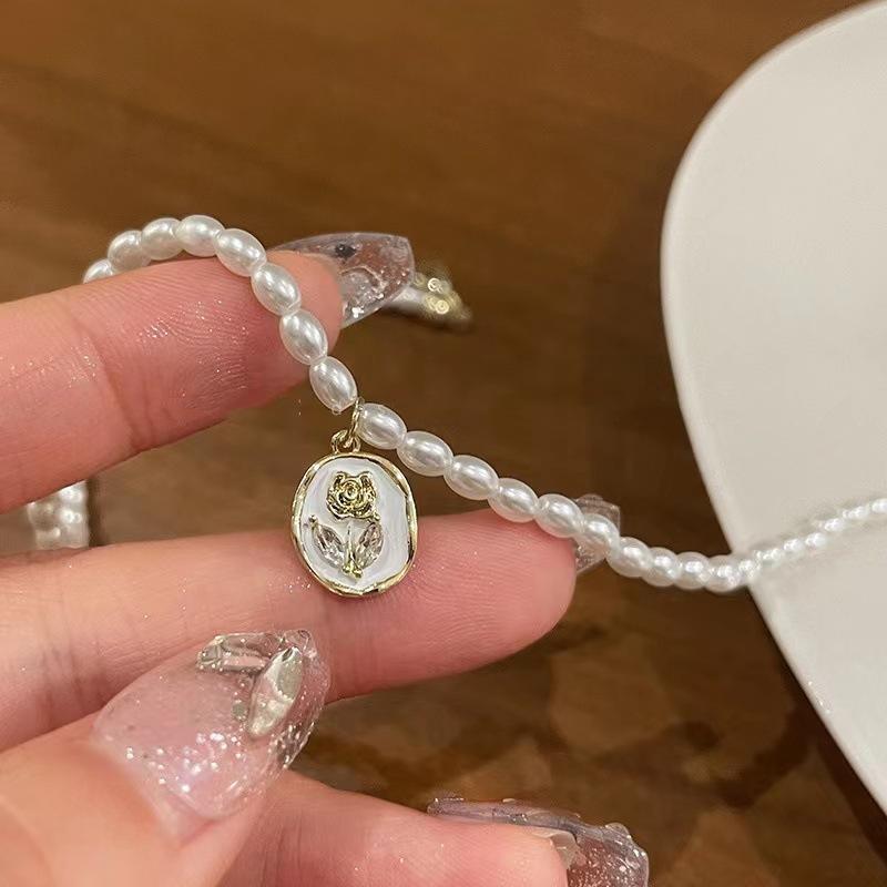French retro rose pendant pearl necklace women s light luxury niche design sense premium collarbone chain sweater chain tide