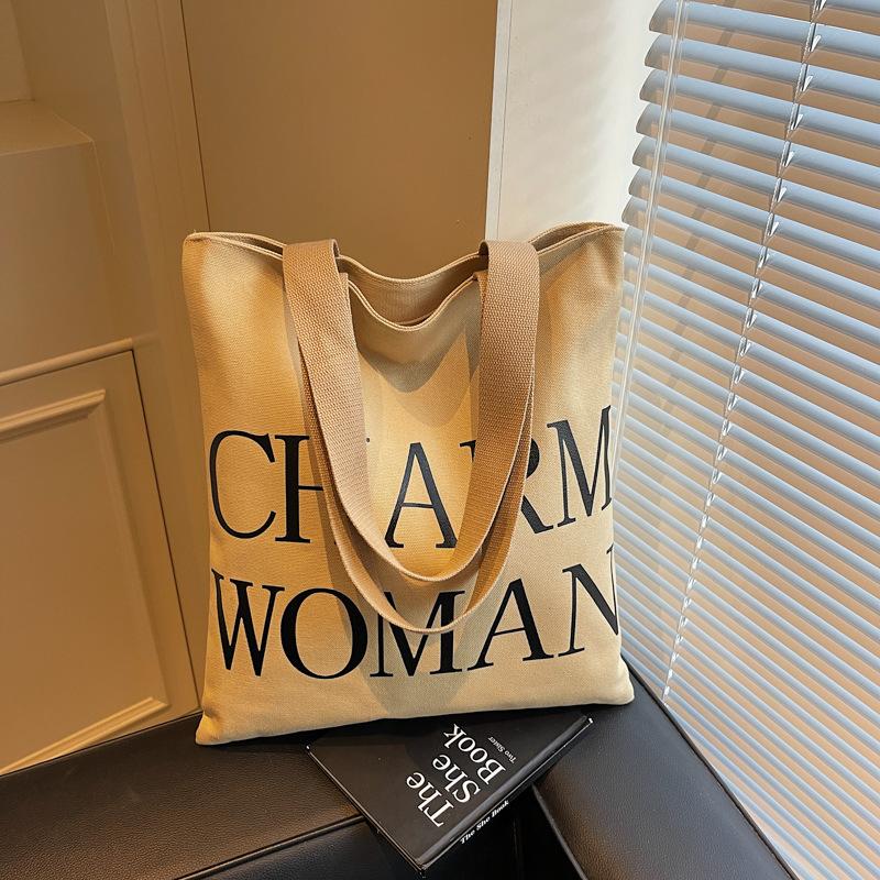 Large capacity alphabet canvas bag women's new fashion portable commuter bag versatile shoulder tote bag