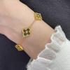 Pulsera de trébol de cuatro hojas para mujer, estilo palacio retro, lujo accesible, moda elegante.