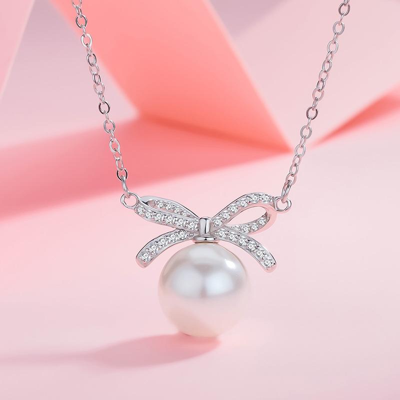 

New Fashionable Bow Necklace for Women, Niche, Light Luxury Pendant, Pearl Collarbone Chain 40CM