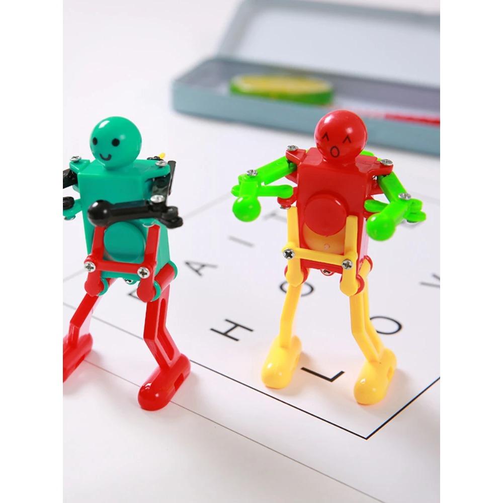 Aufziehbarer Tanzender Roboter Spielzeug für Baby Kind Entwicklungsgeschenk Puzzle Aufziehspielzeug Fidget Spielzeug für Kind Familienspielzeug