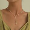 Elegant Bow Pearl Tassel Pendant Necklace – Chic and Versatile Women's Accessory