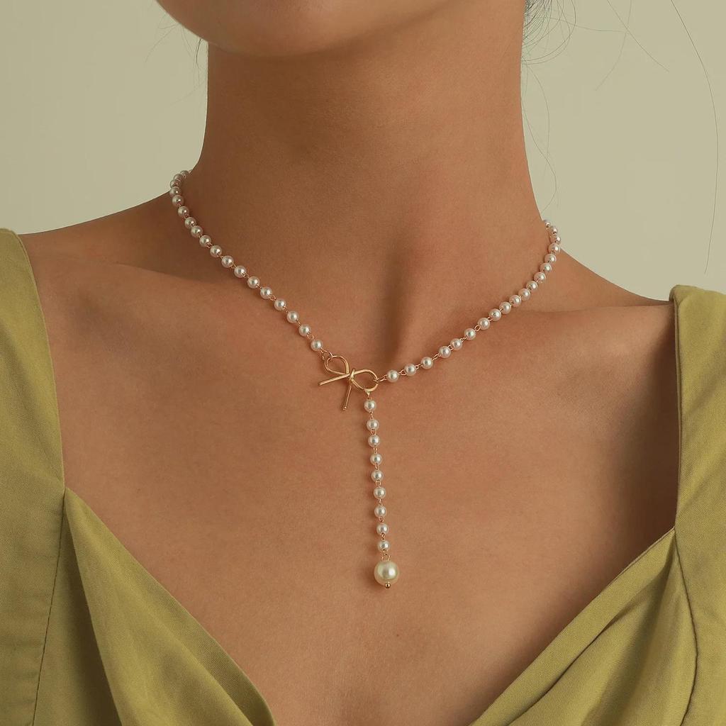 Elegant Bow Pearl Tassel Pendant Necklace – Chic and Versatile Women's Accessory