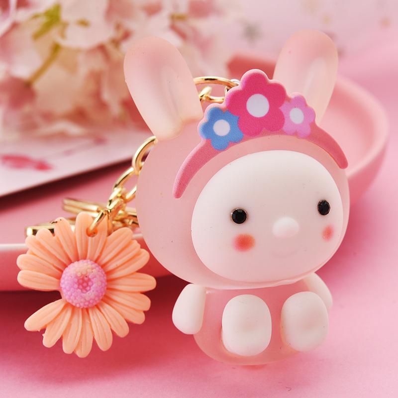 

Брелок для ключей «Кролик» из матового акрила с подвеской в виде хризантемы — креативный аксессуар для школьных сумок и учеников Light Gold Clip + Luminous Rabbit + Flower светло-розовый