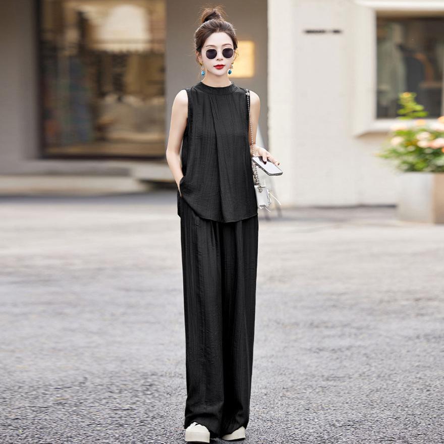 

Комплект из двух предметов: топ без рукавов и брюки палаццо. Женский летний новый темпераментный модный повседневный костюм. XXL чёрный