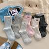 Autumn and Winter Solid Color Soft and Comfortable Embroidered Letter Mid-calf Pile Socks Are All Sizes
