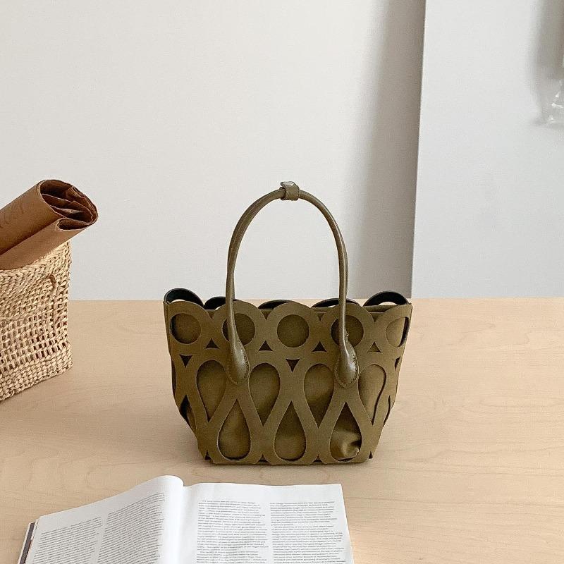 Borsa rétro in camoscio traforato autunno e inverno nuova borsa a cesto tote borsa a mano trend di nicchia creativa