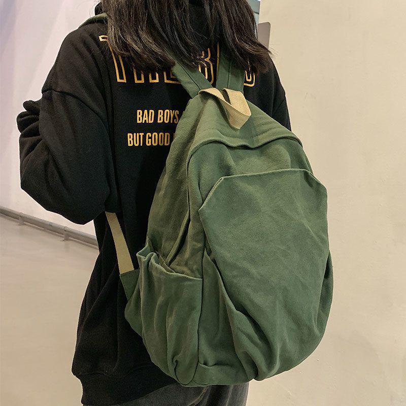 2025 Durable Canvas Solid Color Backpack for Female College Students - Korean and Japanese Style Travel Schoolbag
