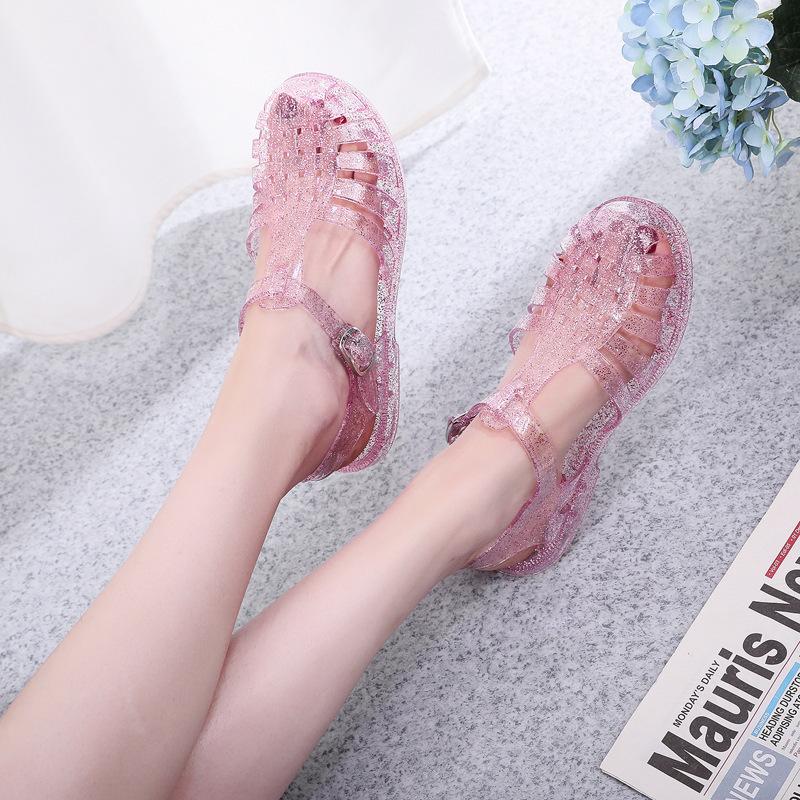 Baotou sandals women's transparent solid color hole shoes spring and summer new casual outer wear hollow breathable flat sandals