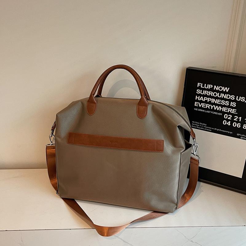 Large-capacity travel bag Women's portable travel light bag Sports fitness bag Men's short-distance storage luggage bag