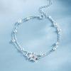 Bohemian-style double-layer leg bracelet with star-shaped pendant and synthetic zircon inlay, layered ankle jewelry suitable for daily wear