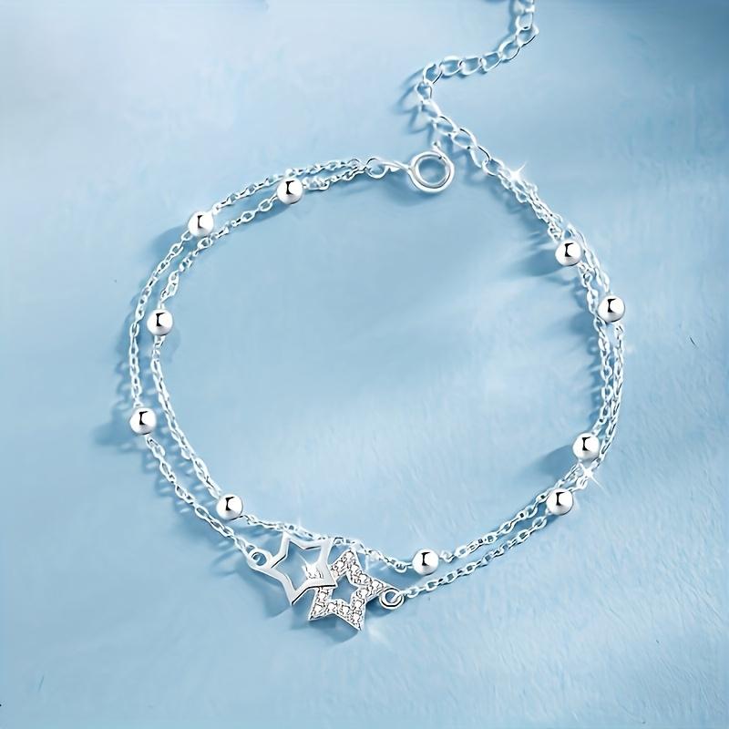 Bohemian-style double-layer leg bracelet with star-shaped pendant and synthetic zircon inlay, layered ankle jewelry suitable for daily wear