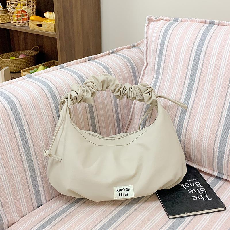 Niche messenger bag women's 2025 new versatile pleated dumpling bag casual loose large capacity armpit bag