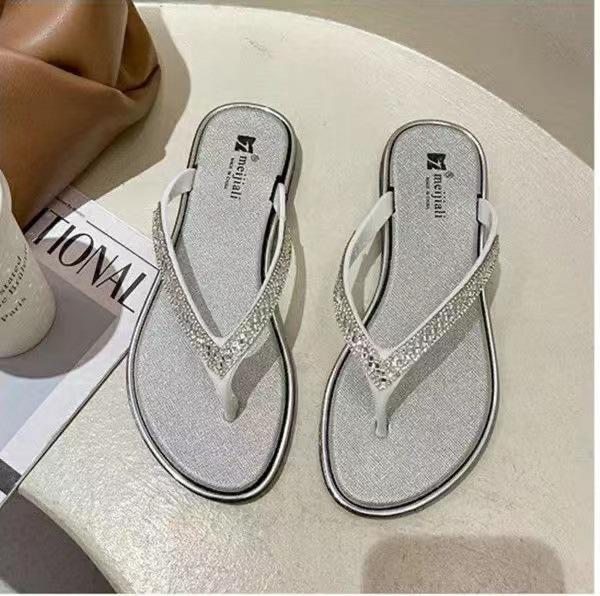 

Шлепанцы женские модные со стразами женские тапочки летние шлепанцы с перемычкой нескользящие крутые тапочки ins тренд пляжная обувь 40