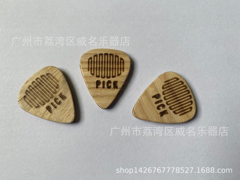 Electric and Wooden Guitar Picks: Thumb, Index, and Acoustic Options