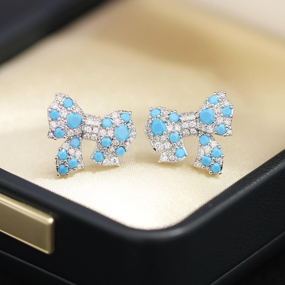 Shining diamond zircon bow stud earrings women's light luxury fashion personality niche design sense high-end sense earrings flash
