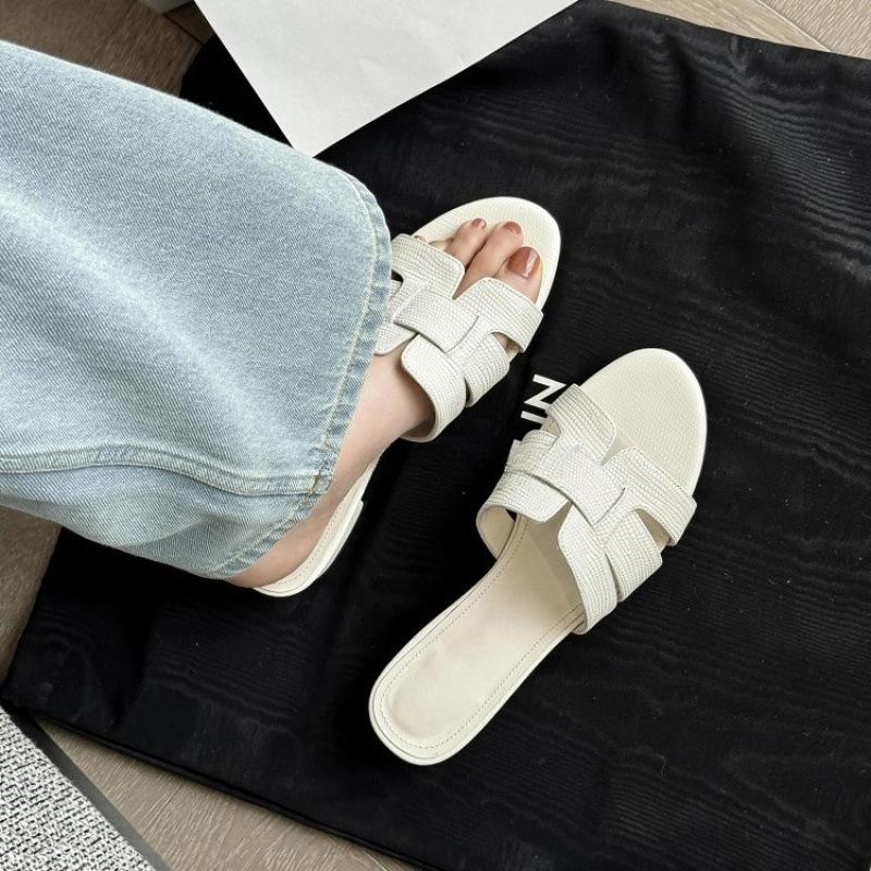 

Temperament versatile one-word drag thick heel outer wear wear versatile casual soft leather woven vacation beach cool slippers women s summer 35 чорний