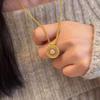 [Rose Window] Golden Pink Eight Treasures Compass Pendant Necklace Niche Design Sense Exquisite Heavy Industry Versatile Necklace