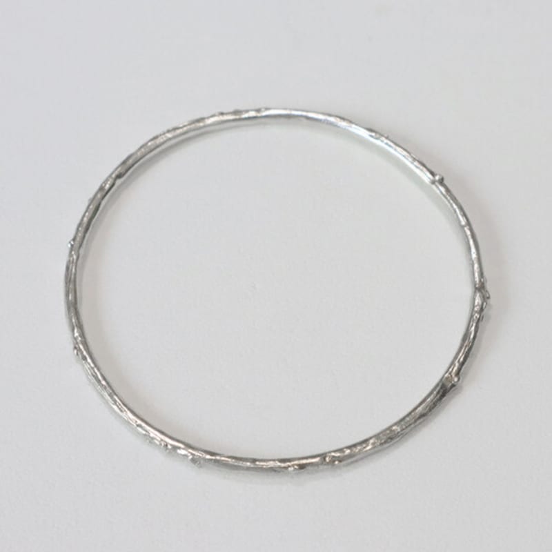 BURIN Hole flow Bangle