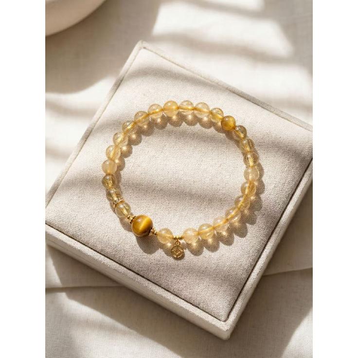 

Natural golden rutilated quartz and yellow tiger eye stone bracelet with copper coins for wealth and good fortune, a light luxury niche accessory 6mm Golden Rutilated Quar
