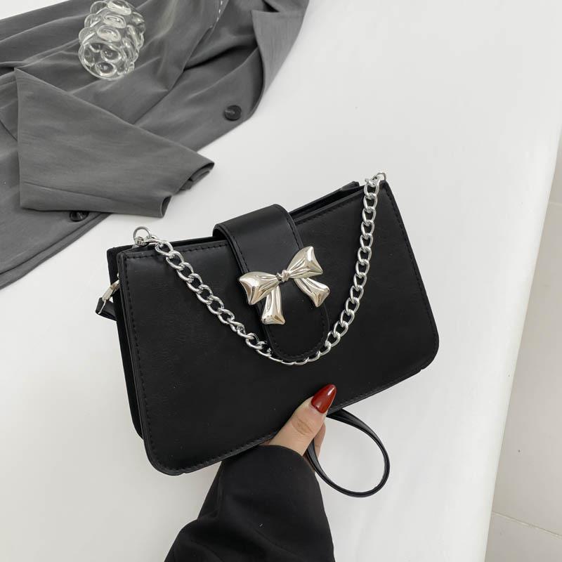 

Модная женская сумка-бантик 2024 года, новая весенняя цепочка, нишевый дизайн, простая маленькая квадратная сумка на плечо чёрный