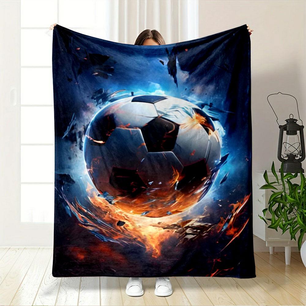 A Fiery Soccer Ball Surrounded by Intense Glowing Flames and Debris. for All Seasons Blanket Lunch Break Throw Gift