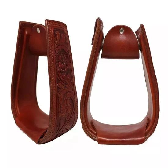 

Пара ковбойских стремян, покрытых кожей ручной работы с тиснением. Седельная амуниция. коричневый