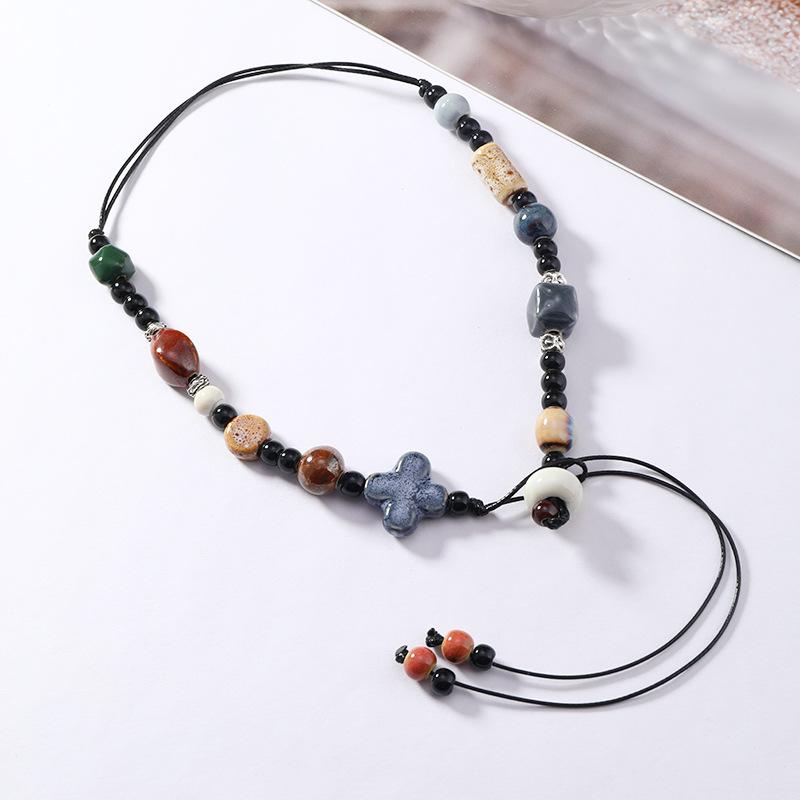 Neue chinesische Art Keramik Schlüsselbeinkette Damen einfach Nische High-End-Gefühl Sommer Retro literarisch und vielseitig Halsketten-Accessoires