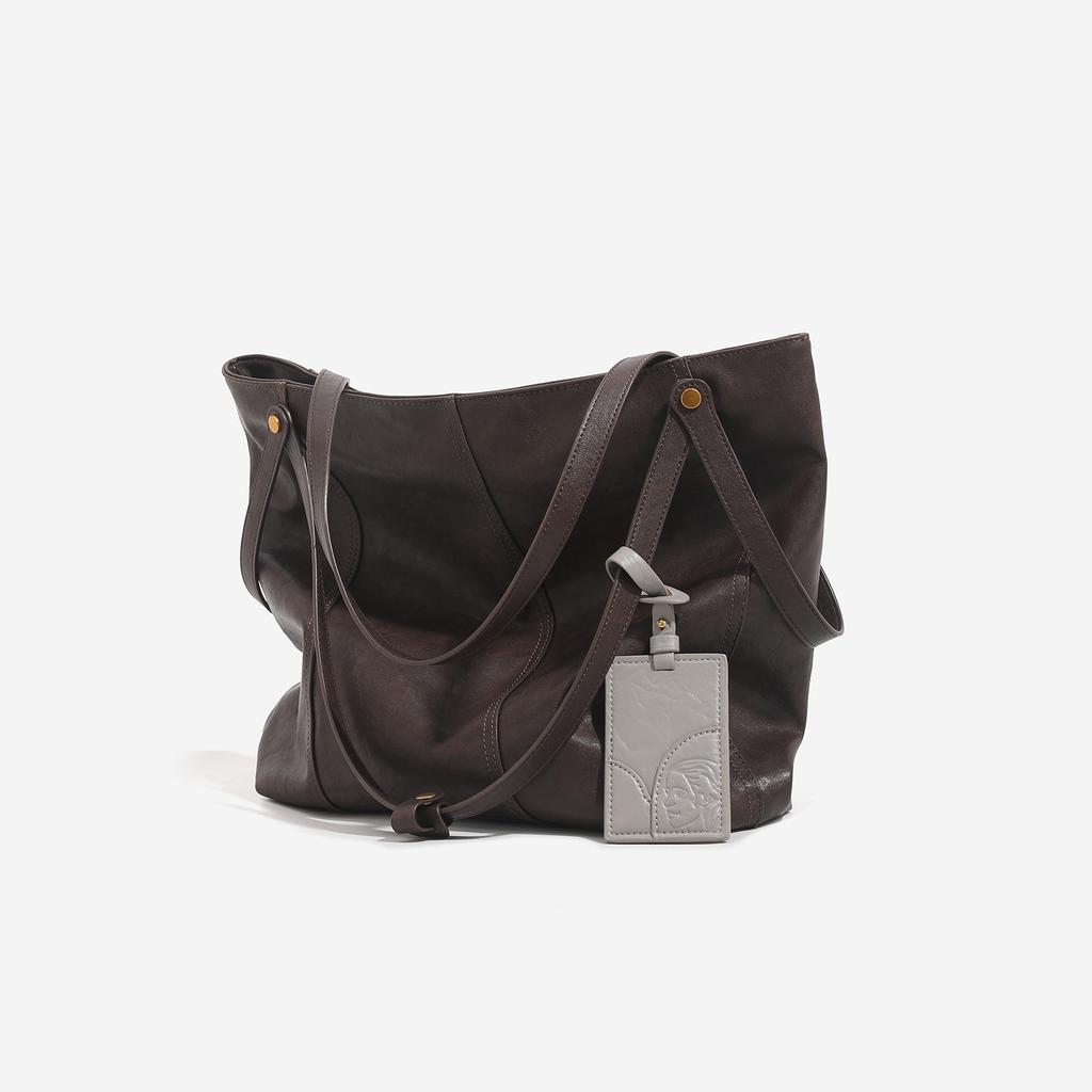 Eine Nischen- und High-End-Tragetasche, schlicht und modisch, große Einzelschultertasche für den Weg zur Arbeit