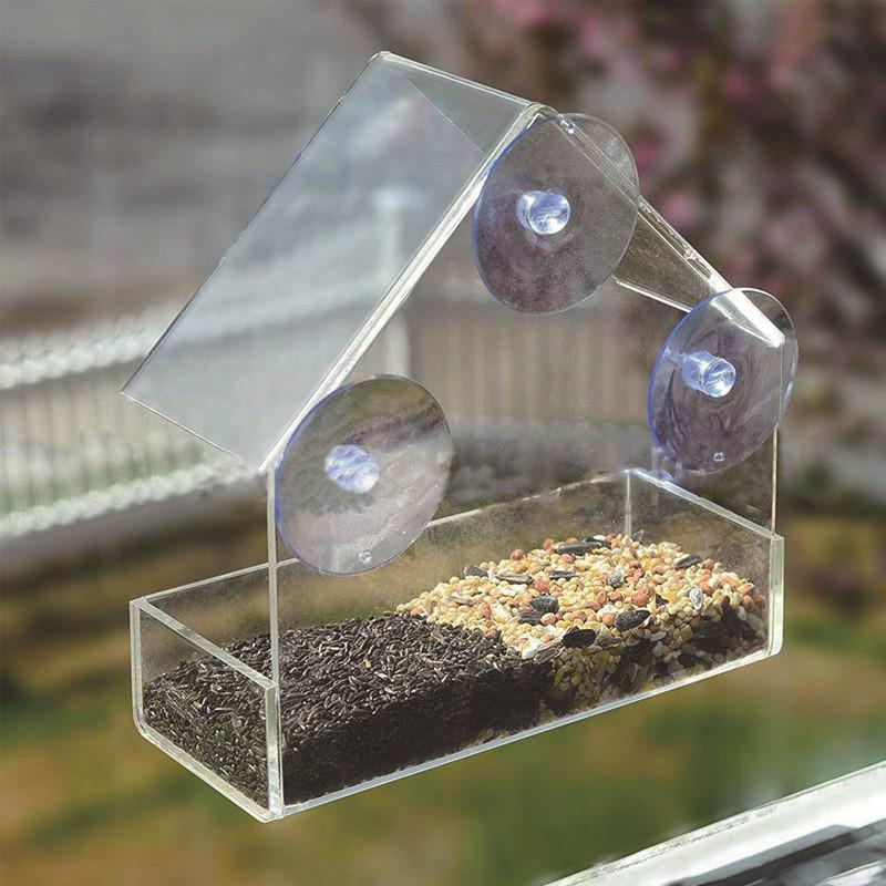 Akrylátové závěsné krmítko pro ptáky s ochranou proti stříkající vodě na balkón nebo okno.