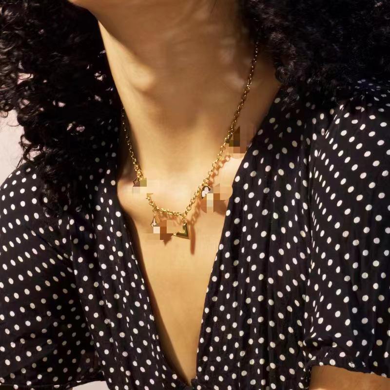 European & American Luxury White Mother-of-Pearl Flower V-Shaped Titanium Steel Necklace - Non-Fading, Niche Design