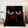 Red and white angry eyes with an arched red frown on a black background. for all seasons blanket lunch break throw gift