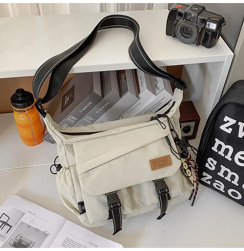 Schoolbag women's messenger bag tide brand ins tooling style Japanese casual men's bag large capacity shoulder bag personalized mailman bag tide