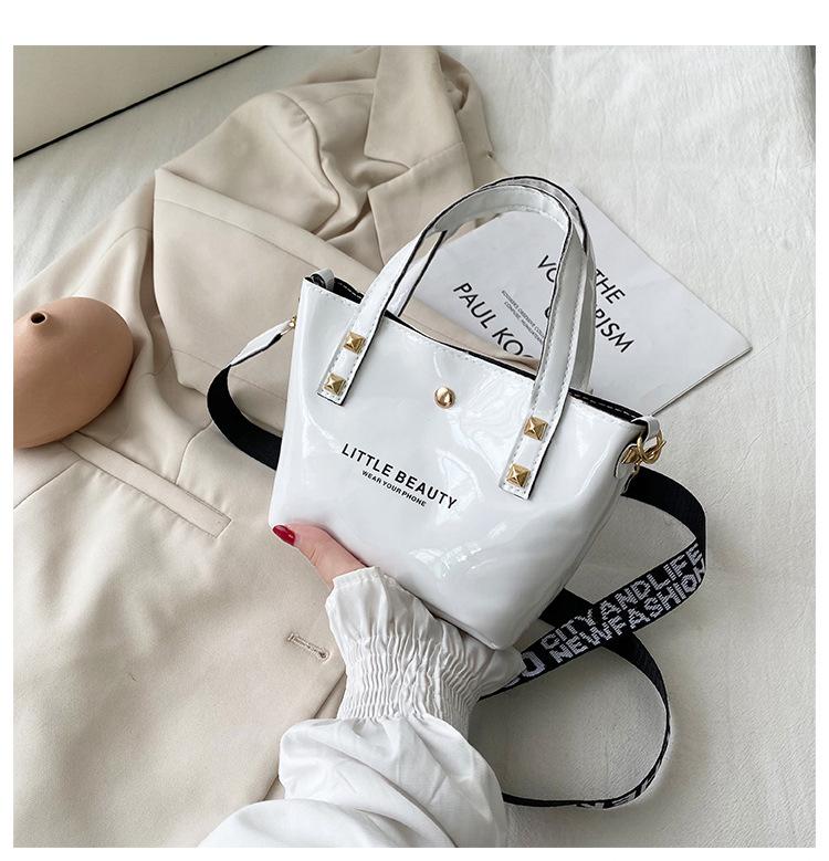 

Guangzhou women s bag new fashion women s bag letter wide mouth shoulder strap women s handbag білий