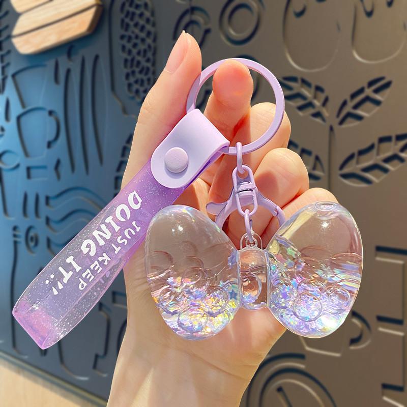 

Брелок для бутылки из плавающего акрила с бантом - Идеальный подарок на день рождения для девочек фиолетовый