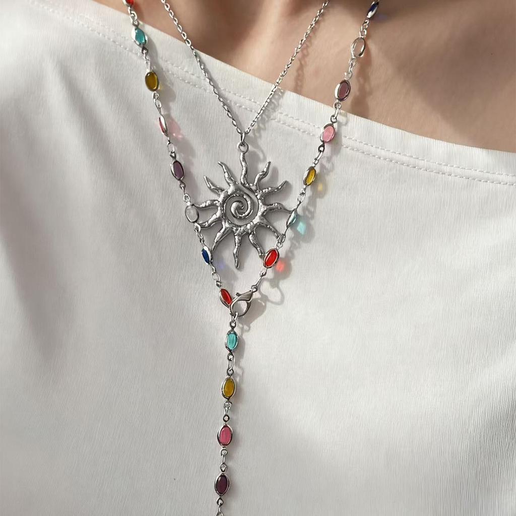 European and American sun pendant necklace light luxury high sense tassel eye long chain color cold wind collarbone chain