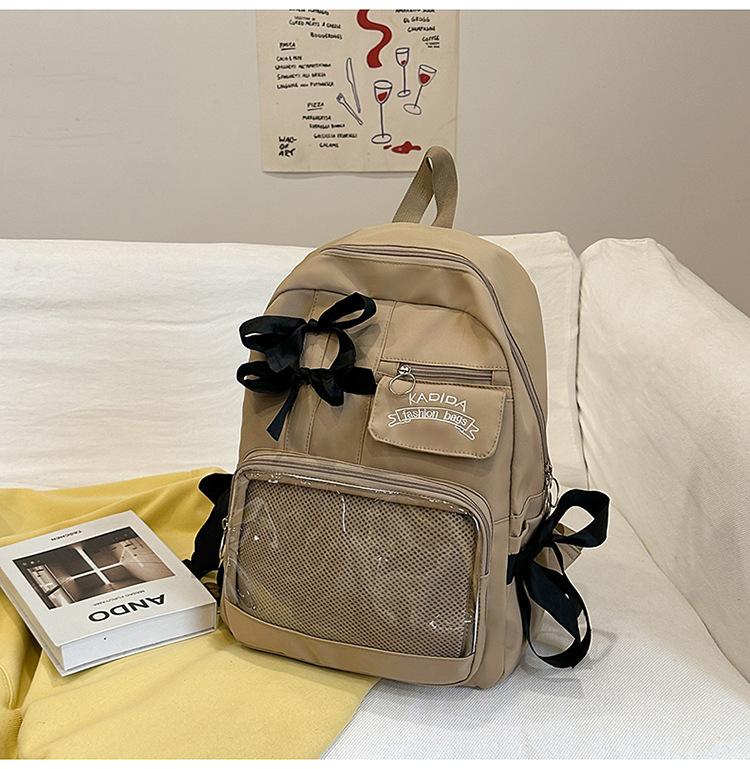 Bow schoolbag female corduroy junior high school students primary school students Internet celebrity backpack large capacity niche backpack