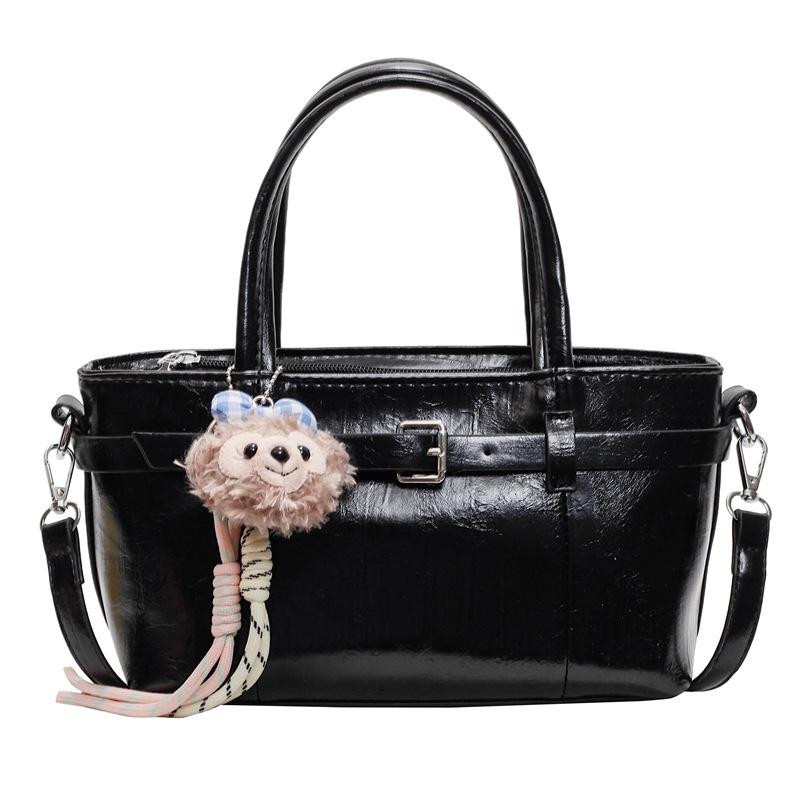 Popular new Korean version of niche casual oil wax leather portable bucket bag fashionable and simple commuter versatile messenger women's bag