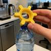 1 Manual plastic bottle and can opener - No Battery Required Easy-to-grip rotating lid design Durable yellow gear design Suitable for soda and