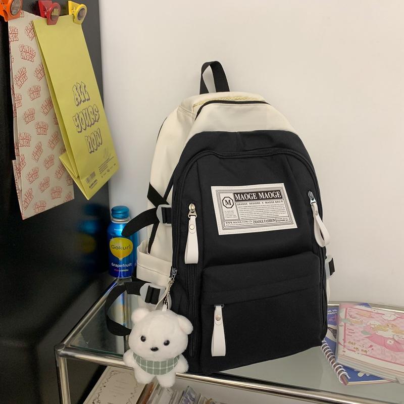 The schoolbag is high-value, fresh and cute, the schoolbag is casual, simple and light, and the commute is versatile and large capacity.