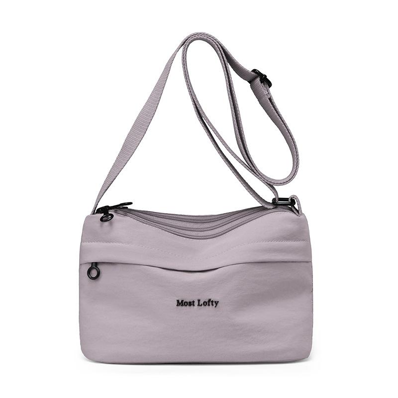 

Женская наплечная сумка Легкая Вместительная Многоотделенческая Нейлоновая сумка кроссбоди светло-фиолетовый