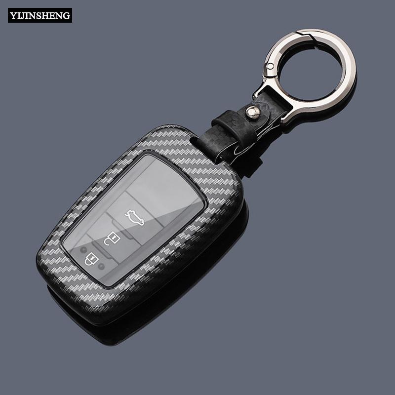 Carbon-Stil ABS + TPU Auto Schlüsselhülle Abdeckung Anhänger Schlüsselanhänger für Toyota Prius Camry Corolla C-HR CHR RAV4 Cruiser Prado Altis