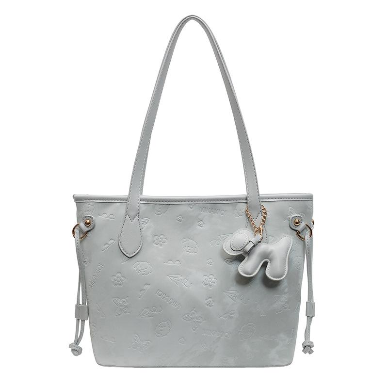 Frühlingsneues Produkt, niedliche geprägte Tragetasche, Studenten-Pendler-Nische, Damen-Schultertasche mit großem Fassungsvermögen