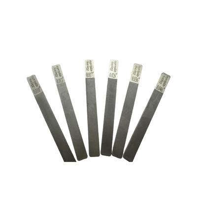 Kit Lima per Capotasto di Chitarra in Ebanite e Tappetino per Pulizia Basso