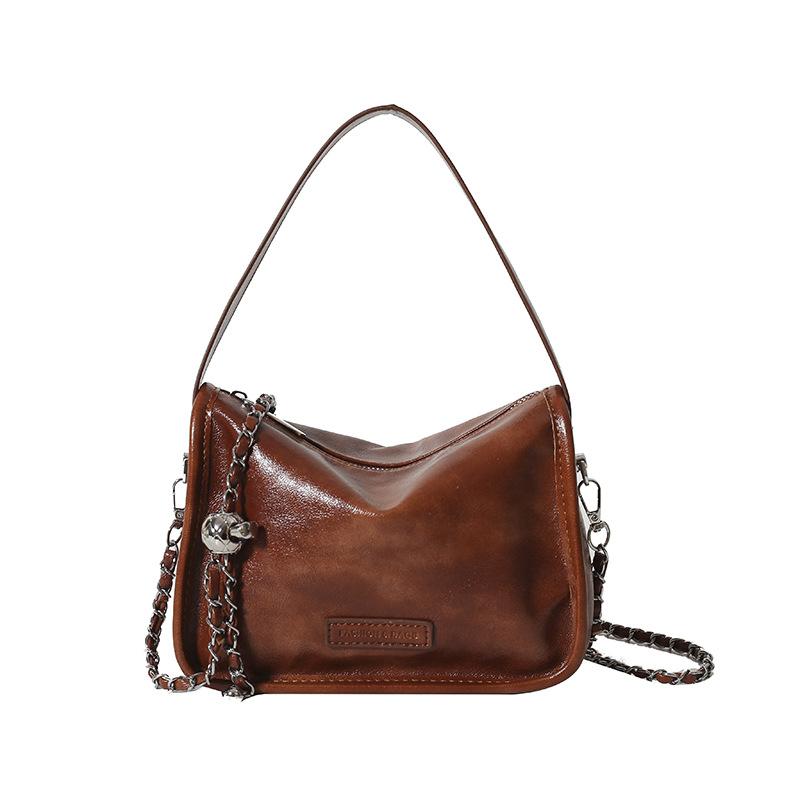 

Осень и зима ретро высококлассные женские сумки 2025 новые повседневные модные высококлассные нишевые портативные сумки-мессенджеры