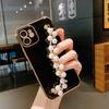 Electroplated Pearl Diamond Bracelet Is Suitable for iPhone 17 Candy Color Straight Edge Fine Hole Apple 16/X Silicone Mobile Phone Case.